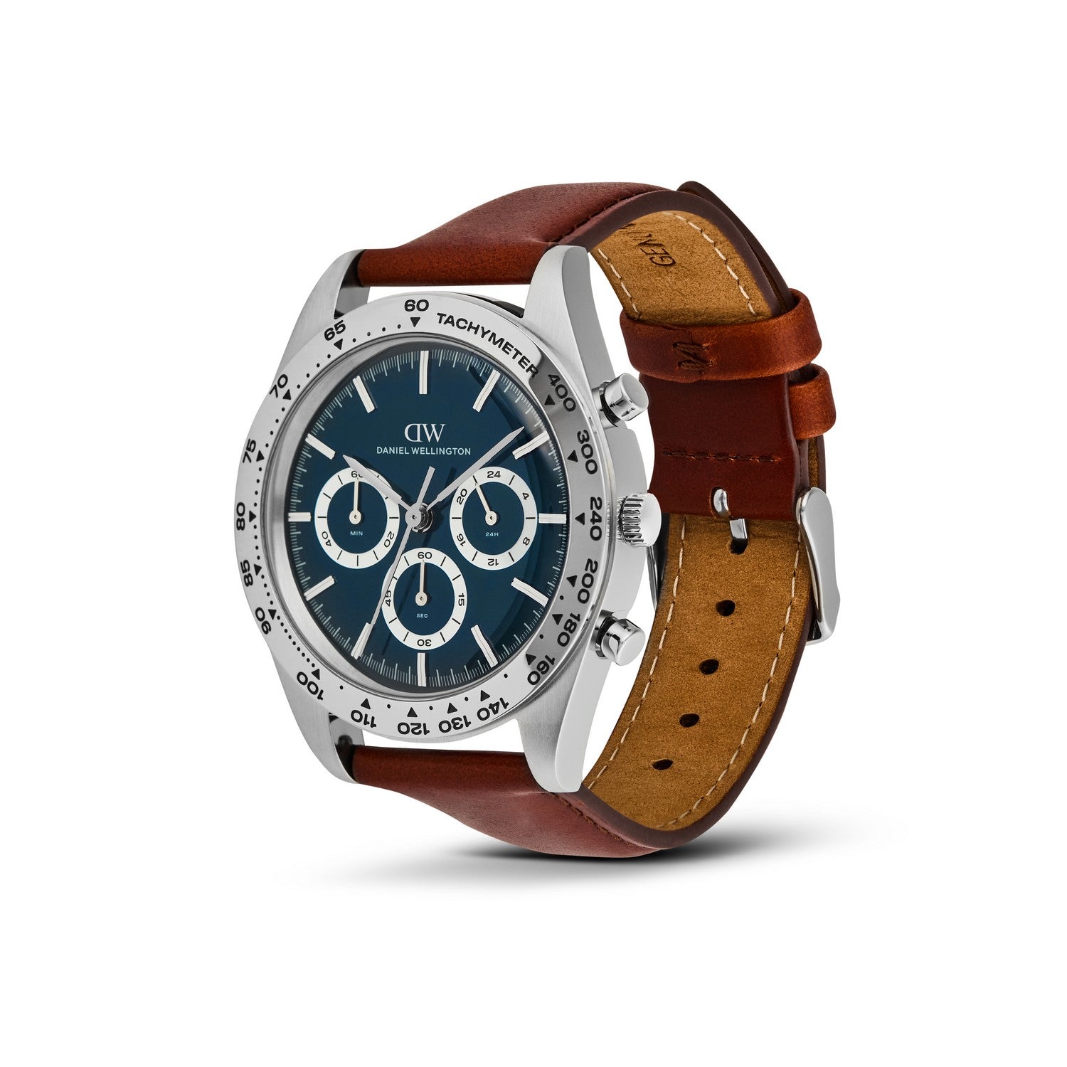 A Daniel Wellington wristwatch with a silver-toned round case, dark blue dial, and brown leather strap, shown on a clean white background.