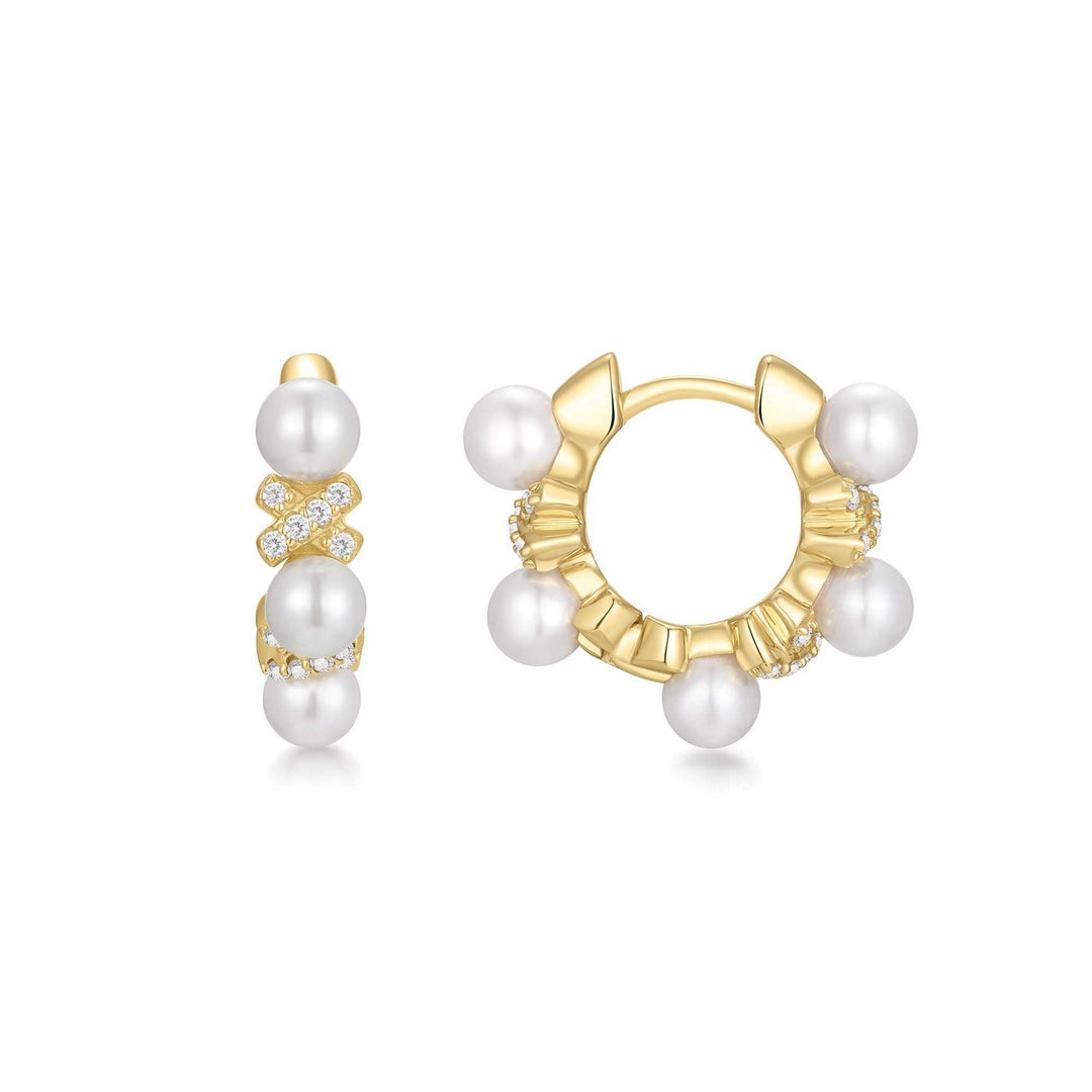 Gold hoop earrings with pearls on a white background