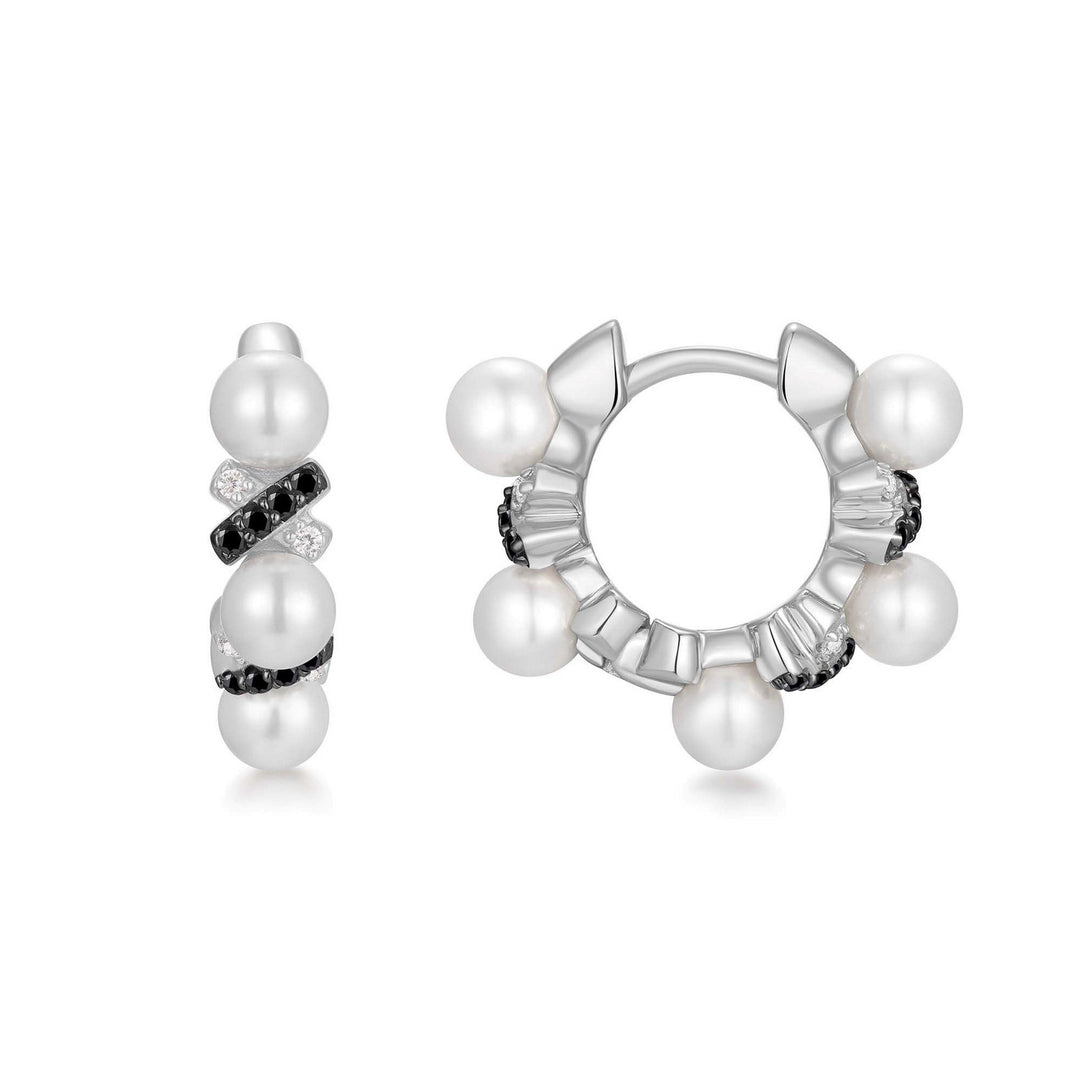 Pair of pearl hoop earrings on a white background