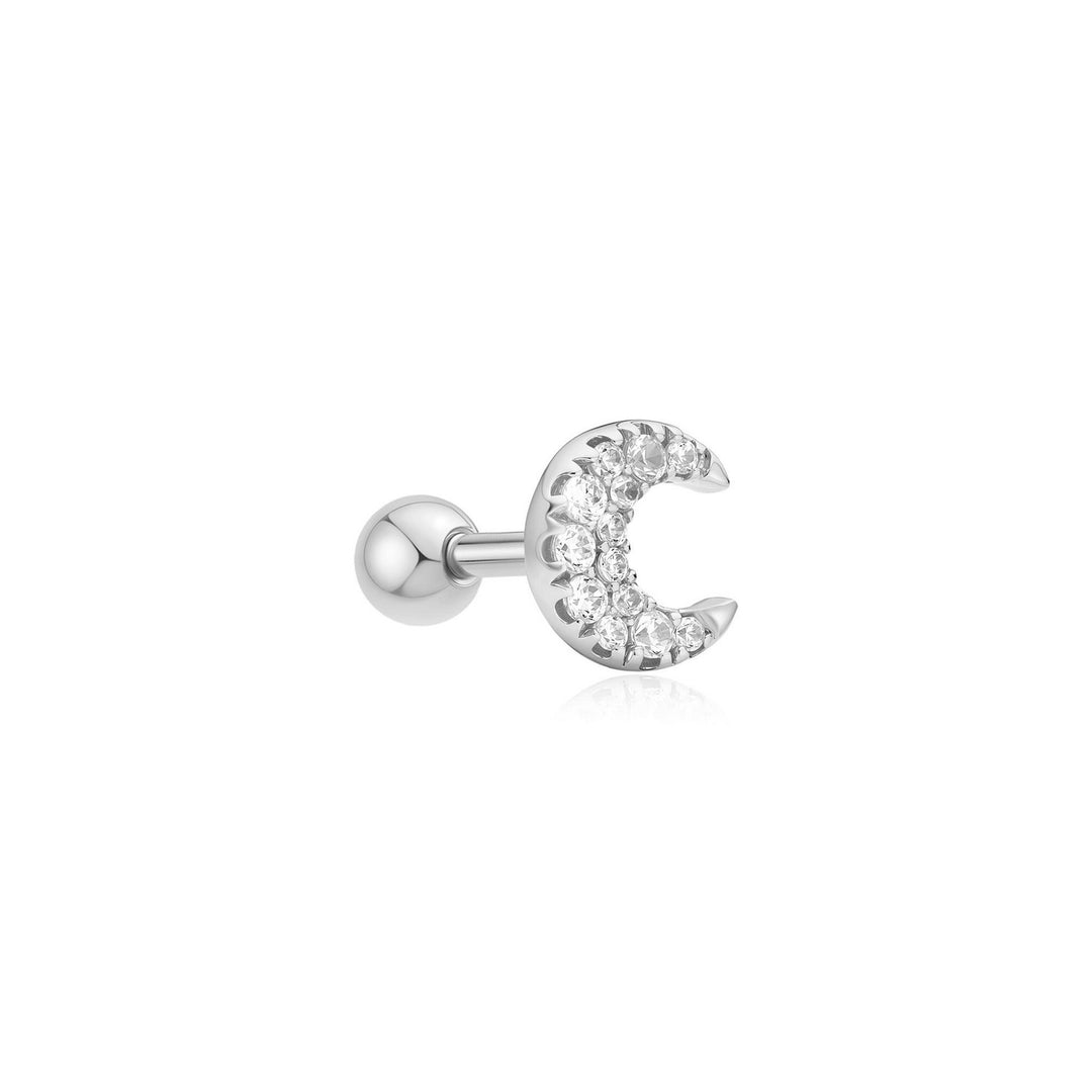 Silver moon-shaped earring with clear stones on a white background