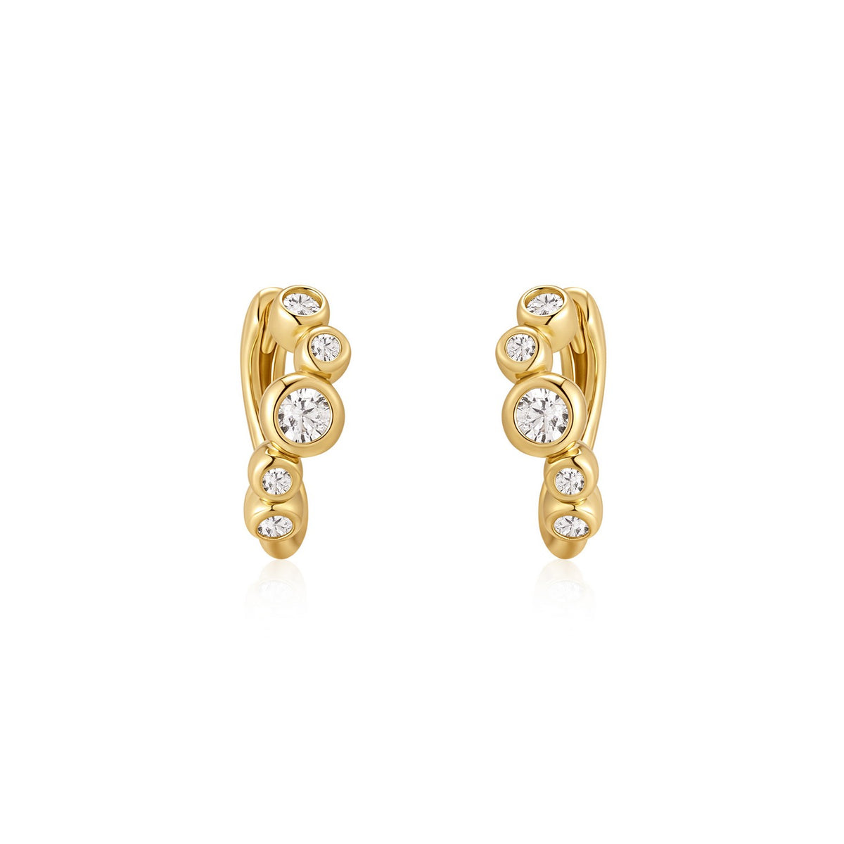 Gold earrings with embedded diamonds on a white background