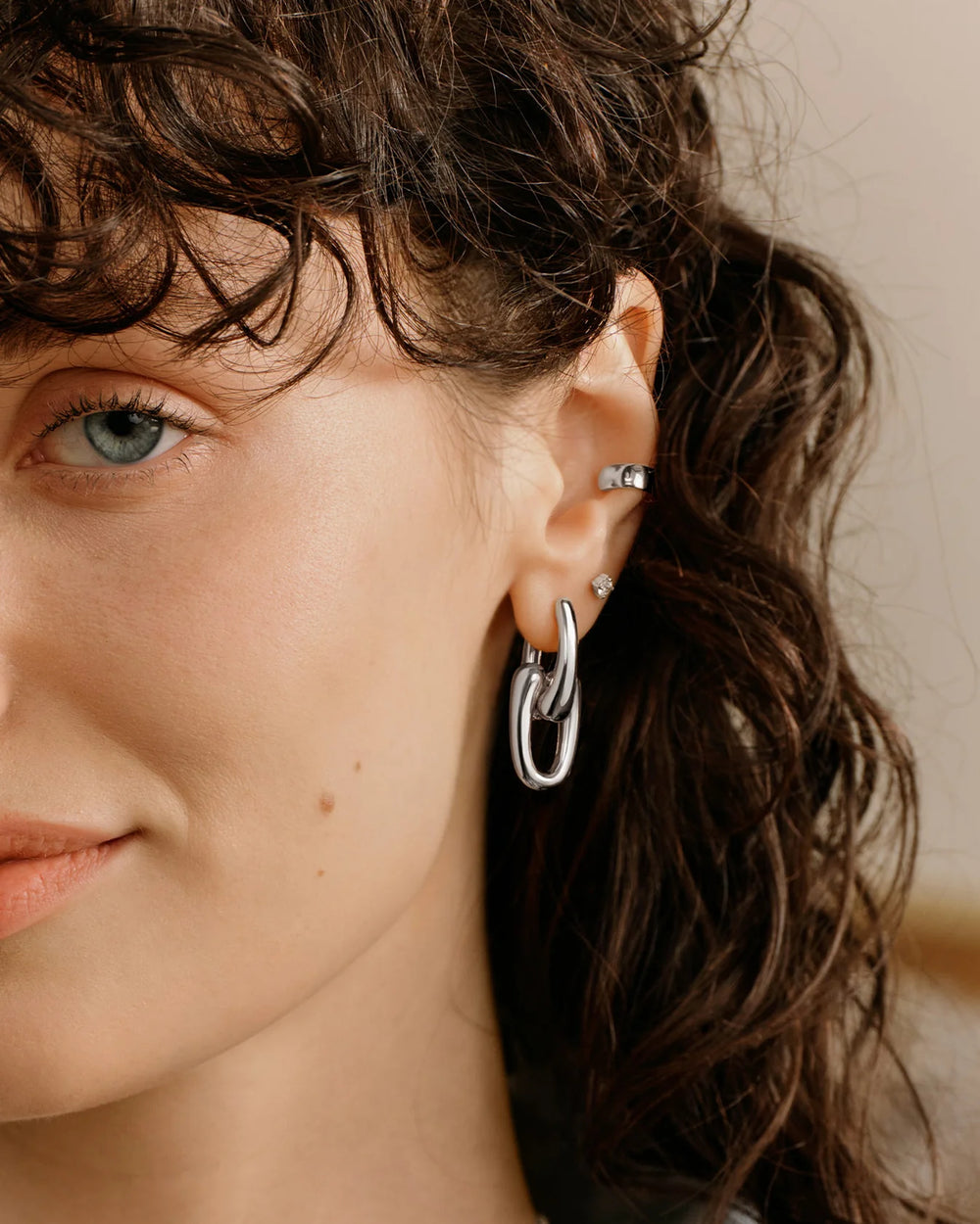 Ania Haie Fluid Light Silver Sculptural Interlocking Huggie Hoop Earrings E078-15H