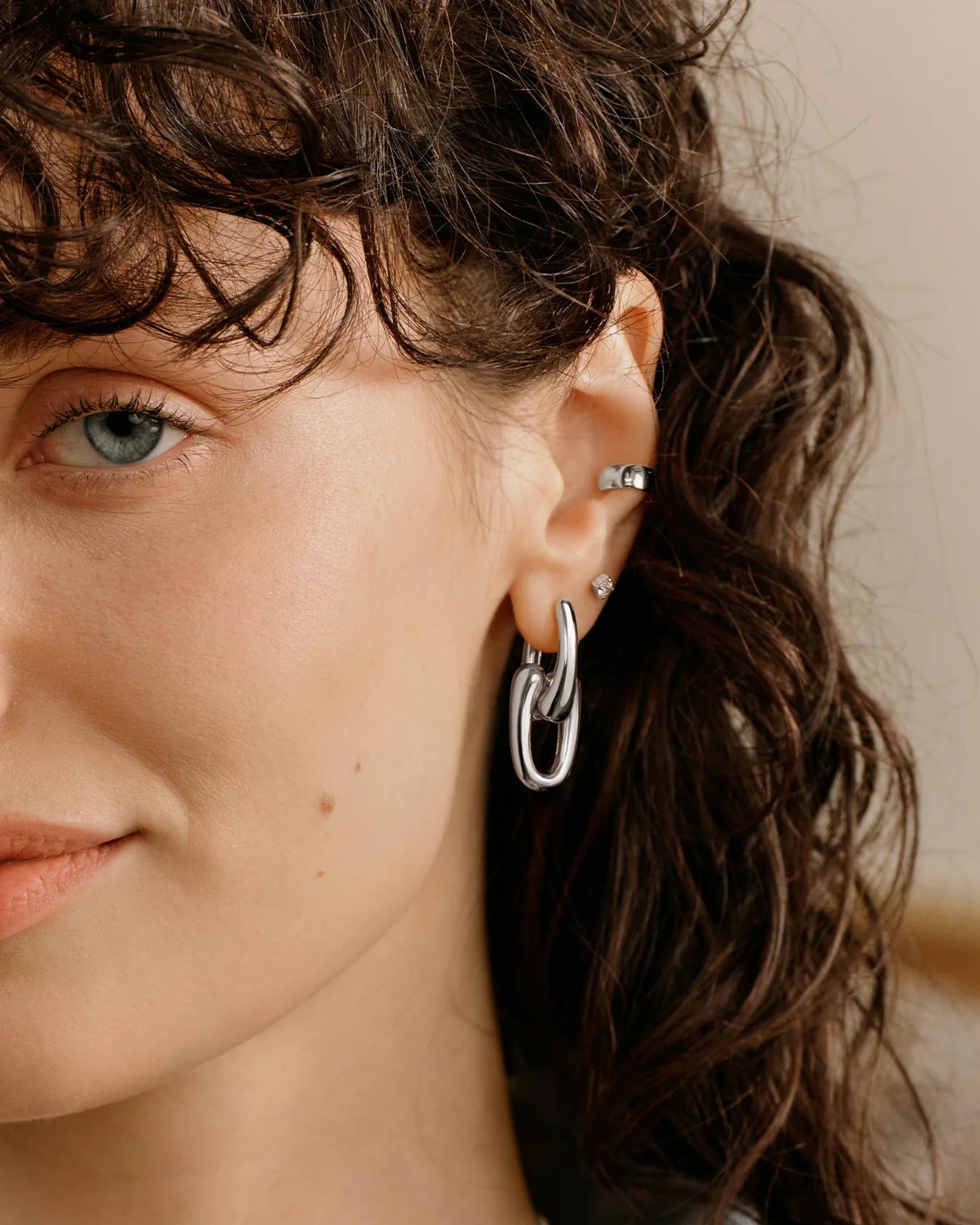 Ania Haie Fluid Light Silver Sculptural Interlocking Huggie Hoop Earrings E078-15H