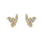 Pair of Dumbo earrings on a white background