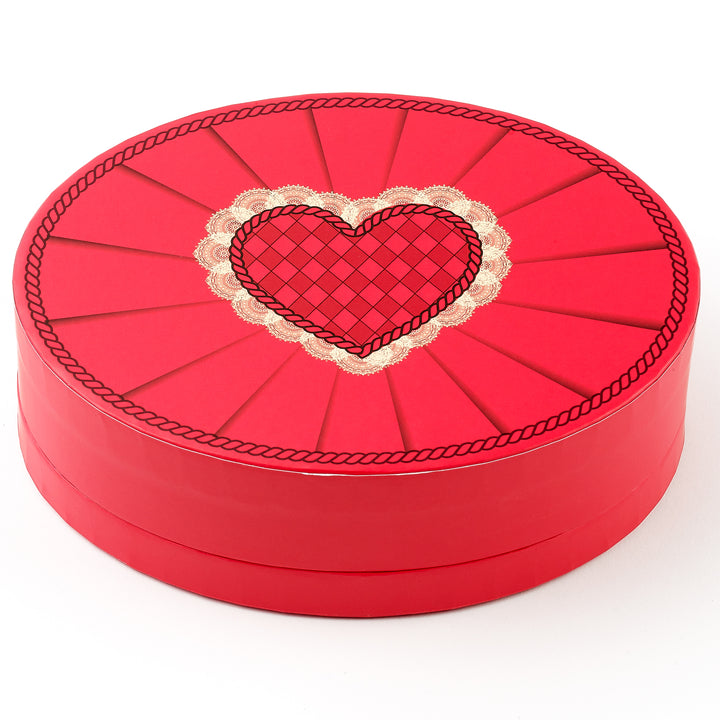 Red round box with a heart design on a white background