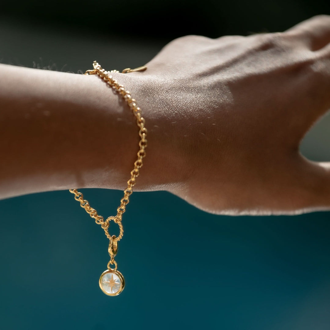 Gold Plated Eternity Twist Charm Bracelet CBRGETWST