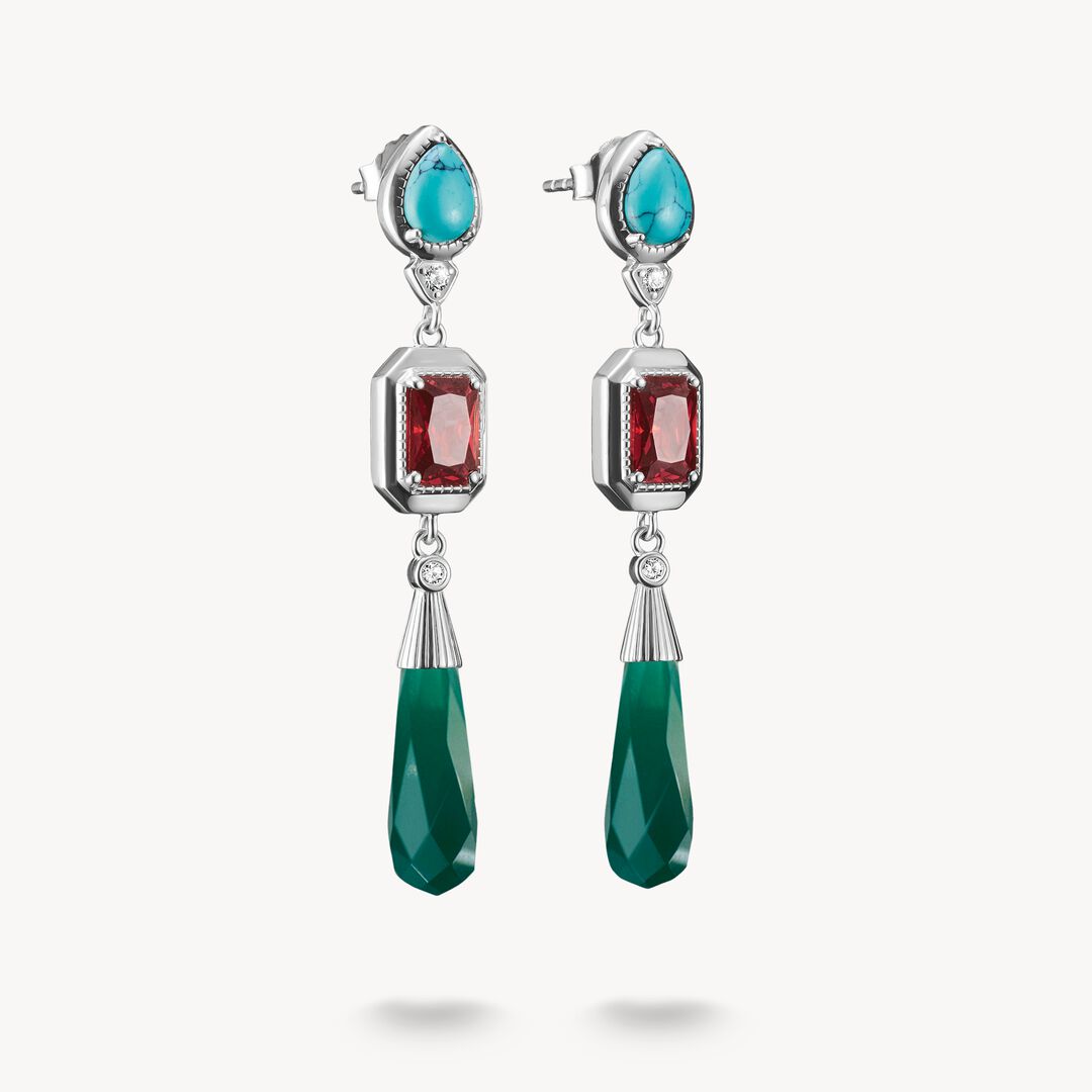 Pair of earrings with gemstones on a white background
