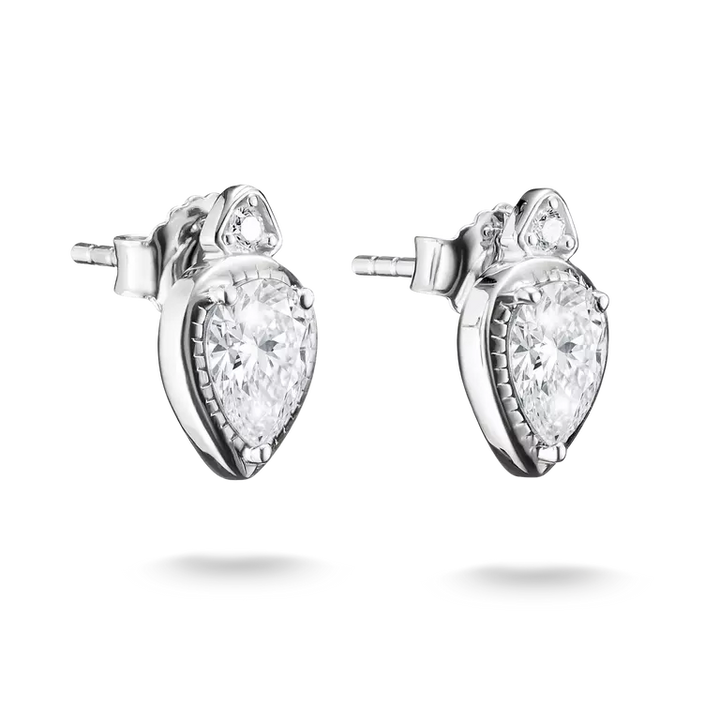 A pair of silver stud earrings featuring pear-cut clear gemstones in a heart-shaped setting with a small triangular accent above, shown on a white background.