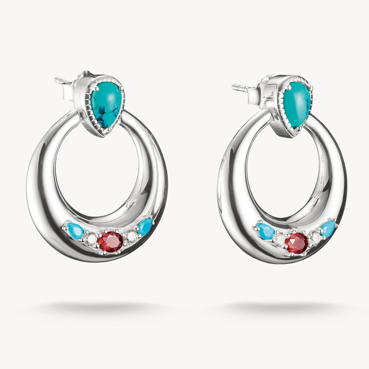 Silver hoop earrings with turquoise and red gemstones on a white background