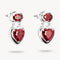 Silver earrings with red heart-shaped gemstones on a white background