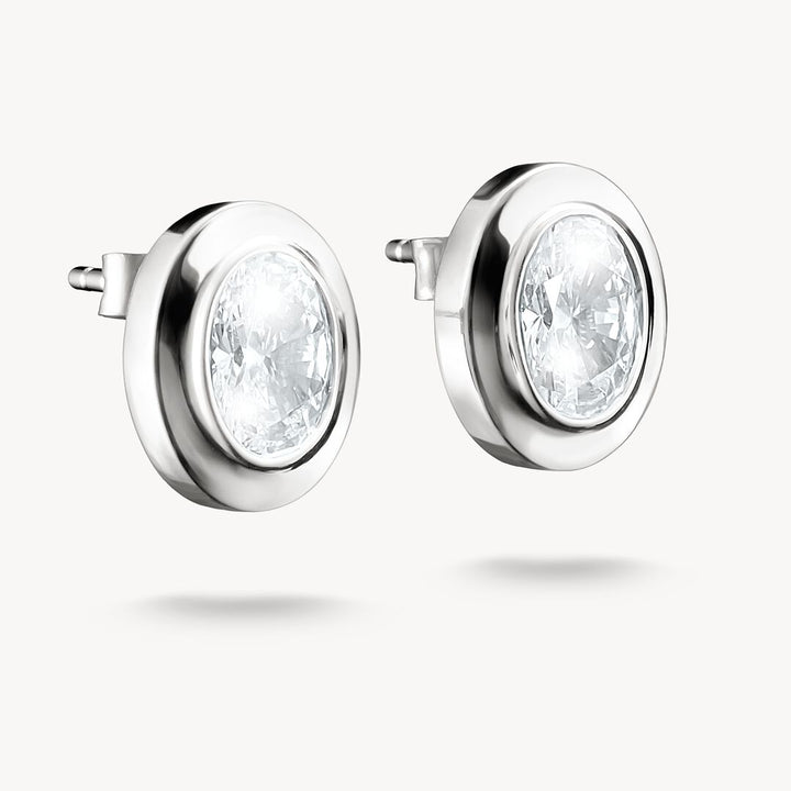 Pair of silver stud earrings with clear gemstones on a white background