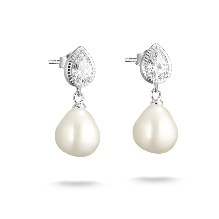 A pair of silver stud earrings featuring a teardrop-shaped clear crystal in a beaded halo setting with a dangling baroque pearl below, shown on a white background with soft drop shadows.