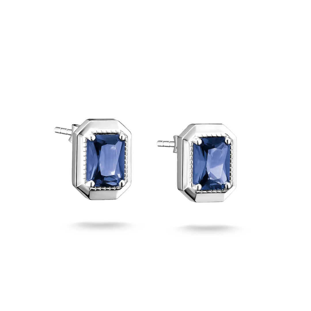 A pair of silver stud earrings featuring rectangular blue gemstones in a bezel setting, shown against a plain white background.
