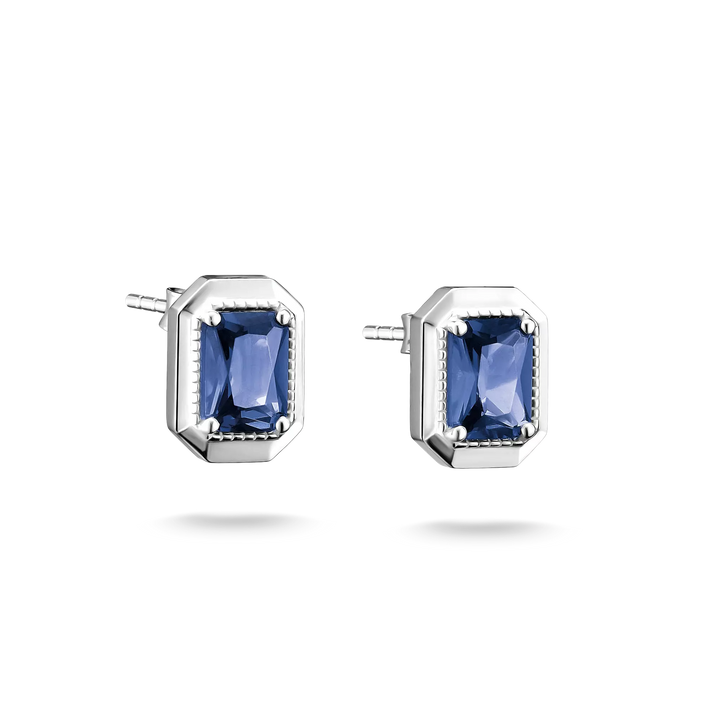 A pair of silver stud earrings featuring rectangular blue gemstones in a bezel setting, shown against a plain white background.