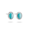A pair of oval stud earrings featuring turquoise-colored cabochon stones surrounded by a halo of small clear stones in a silver-toned setting, shown against a plain white background.