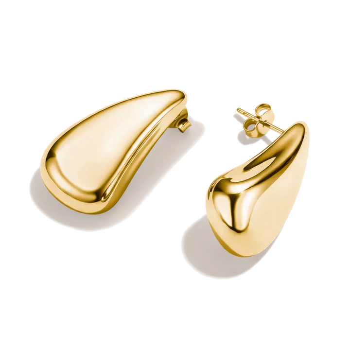 A pair of polished gold teardrop-shaped stud earrings with post backs, displayed on a clean white background.