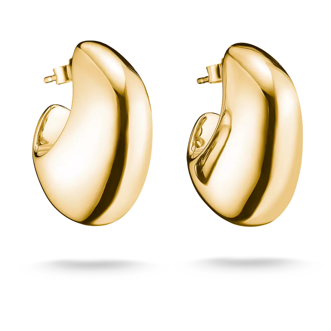 A pair of polished yellow gold hoop earrings with a smooth, rounded organic shape, shown on a clean white background with soft drop shadows.