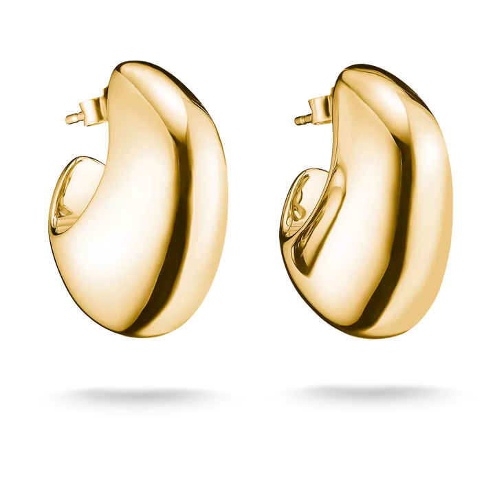 A pair of polished yellow gold hoop earrings with a smooth, rounded organic shape, shown on a clean white background with soft drop shadows.