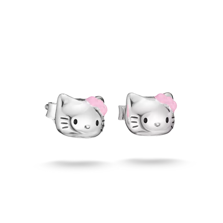 A pair of silver stud earrings shaped like Hello Kitty's head, featuring a small pink bow on each earring, shown against a plain white background.
