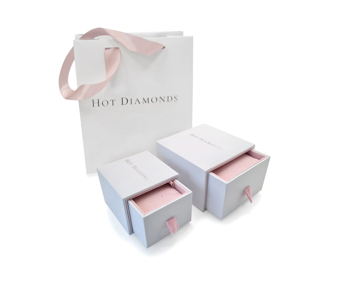 Beautifully packaged Hot Diamonds jewelry set, featuring a branded gift bag and elegant boxes, ideal for luxury gifting.