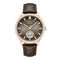 Kenneth Cole watch with brown leather strap and rose gold case on white background