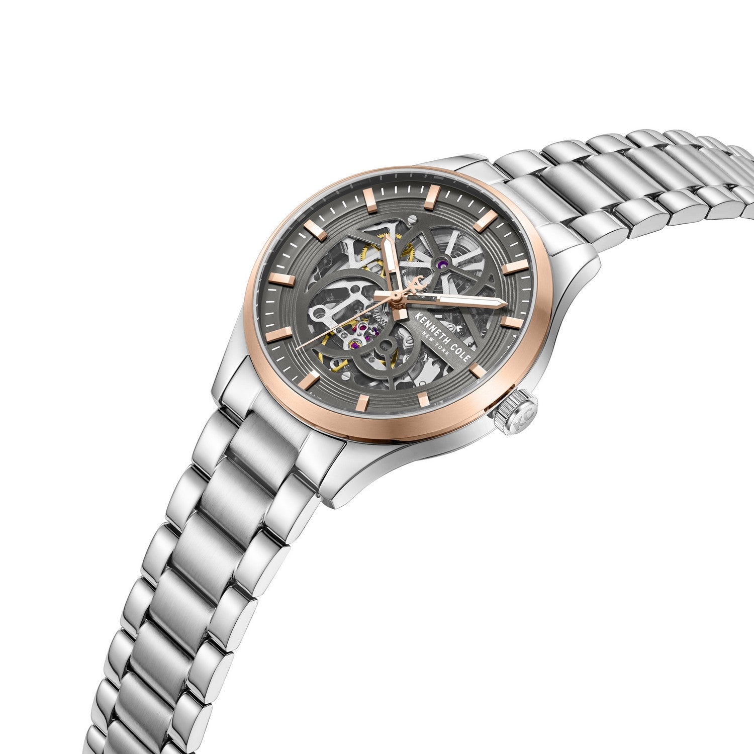 Kenneth Cole watch with silver and rose gold design on a white background