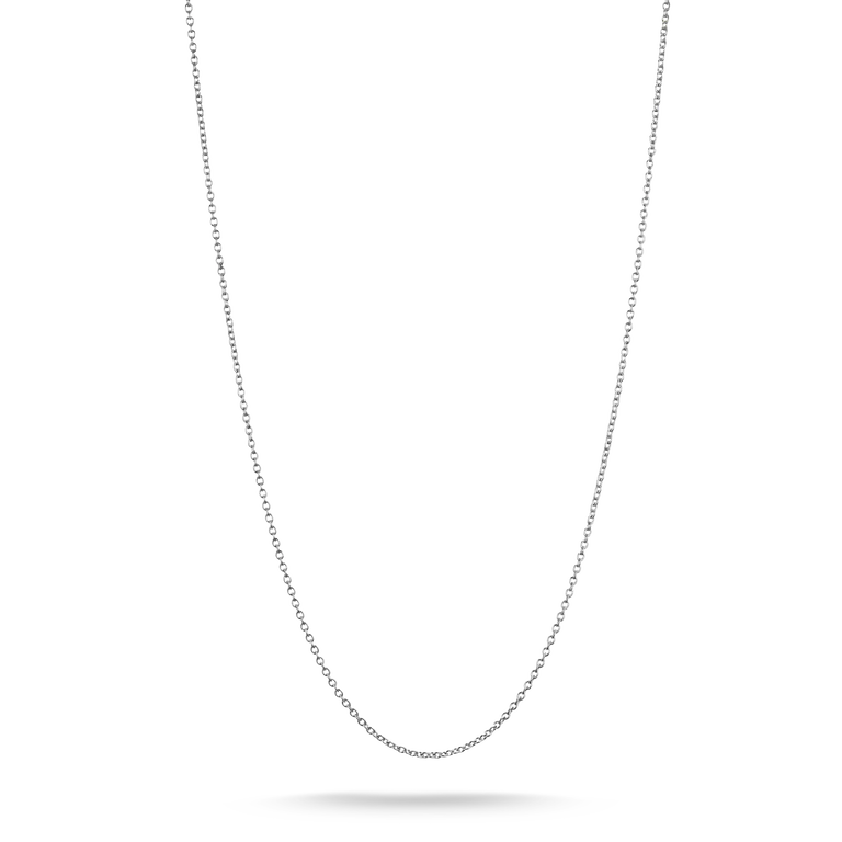 A delicate silver chain necklace shown against a plain white background, suspended in a U-shape with a soft shadow beneath the lowest point.