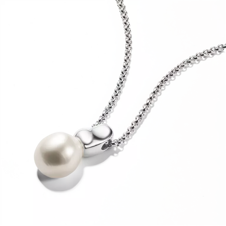 A silver chain necklace with a polished silver heart-shaped pendant holding a single lustrous white pearl, shown on a clean white background.