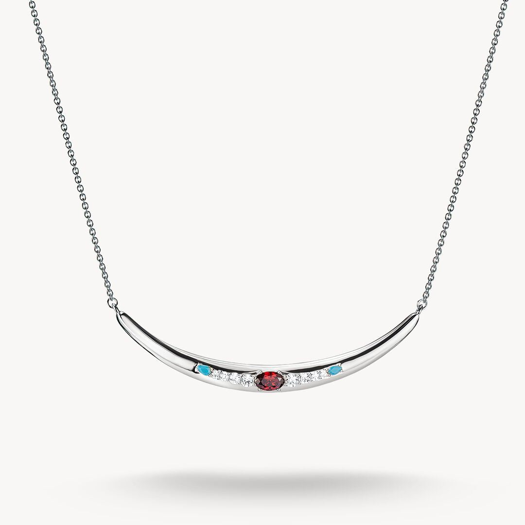 Silver necklace with gemstones on a white background