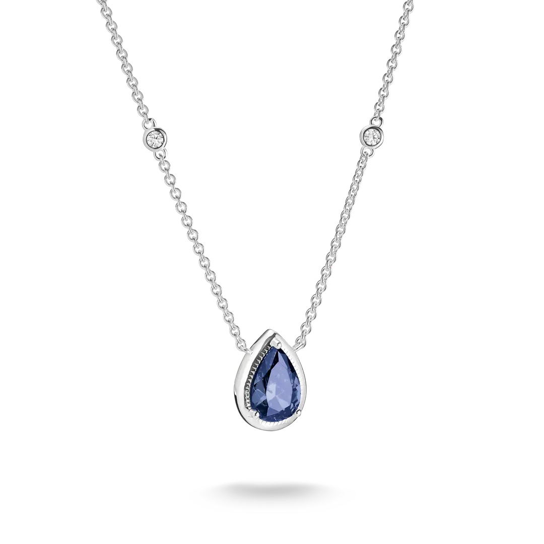 A silver chain necklace featuring a teardrop-shaped blue gemstone pendant with a silver bezel and small clear accent stones, shown on a clean white background.