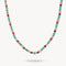Multicolored beaded necklace on a white background