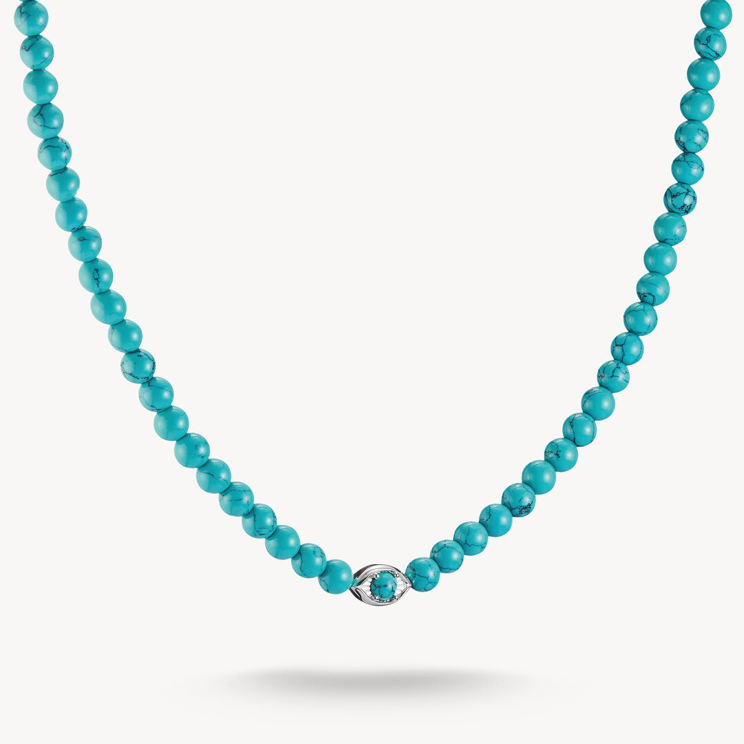 Turquoise beaded necklace with a silver clasp on a white background