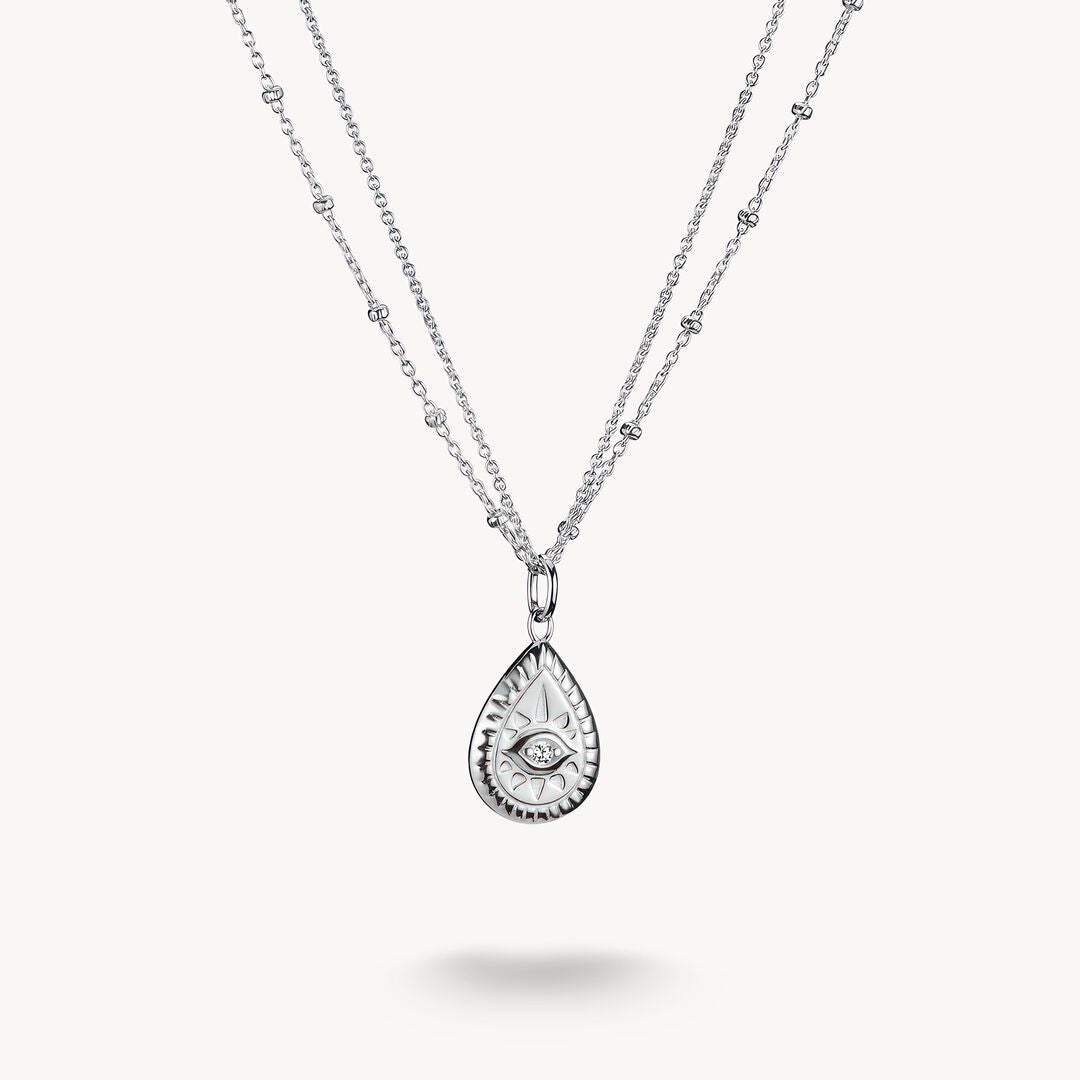 Silver teardrop pendant necklace on a white background