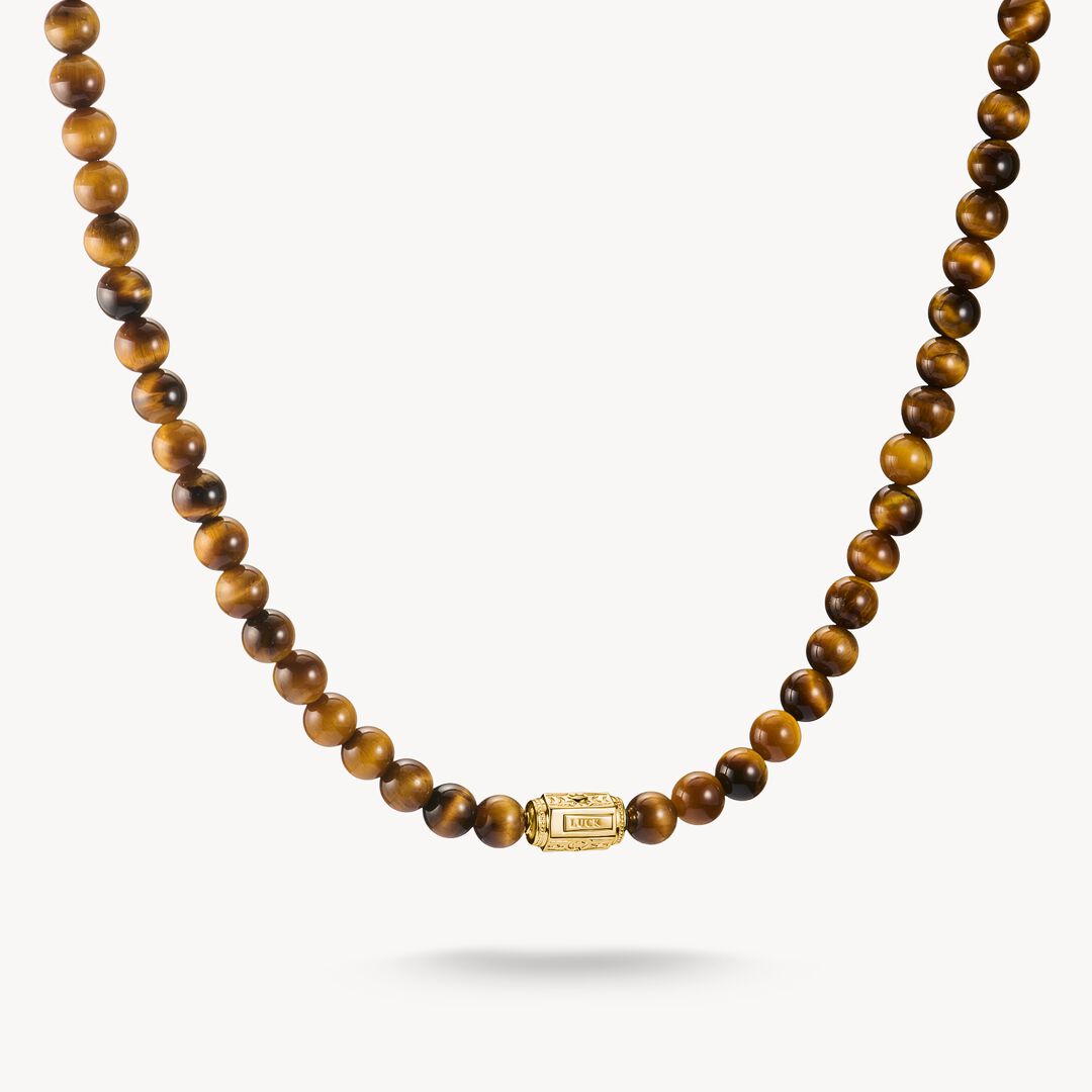 Beaded necklace with a gold clasp on a white background