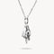 Silver hand-shaped pendant on a chain against a white background