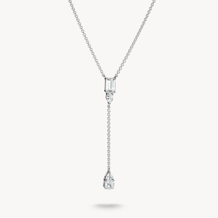 Diamond necklace with two pendants on a white background