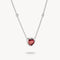 Necklace with a heart-shaped red gemstone pendant on a white background