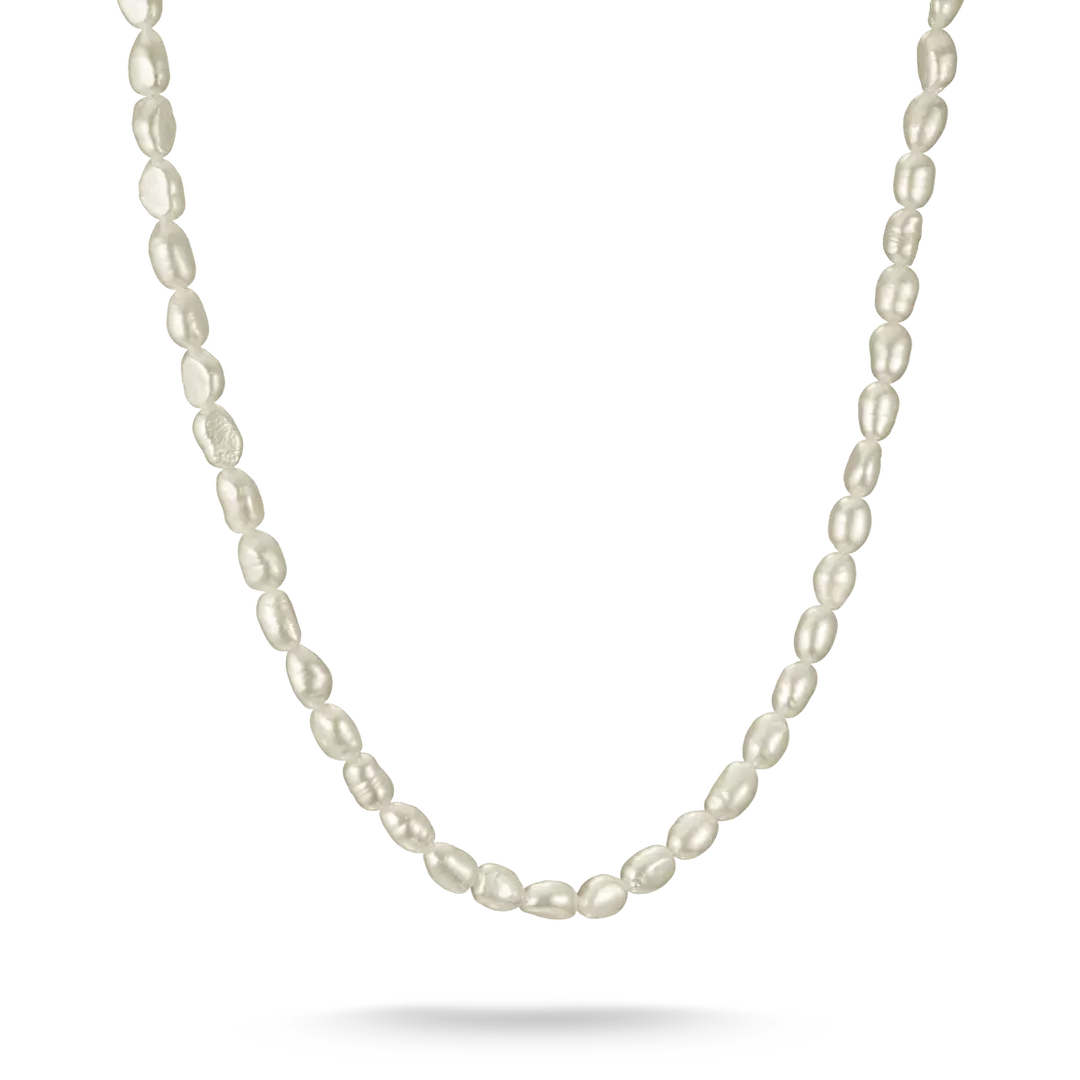 A delicate strand of irregular white baroque pearls draped in a U-shape against a clean white background.