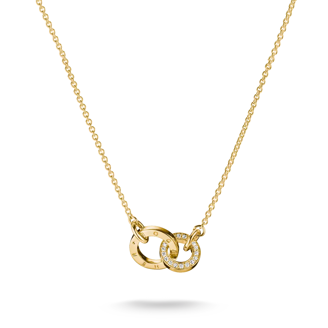 A gold chain necklace featuring two interlocking ring pendants, one with Roman numerals and the other set with small clear stones, shown on a clean white background.