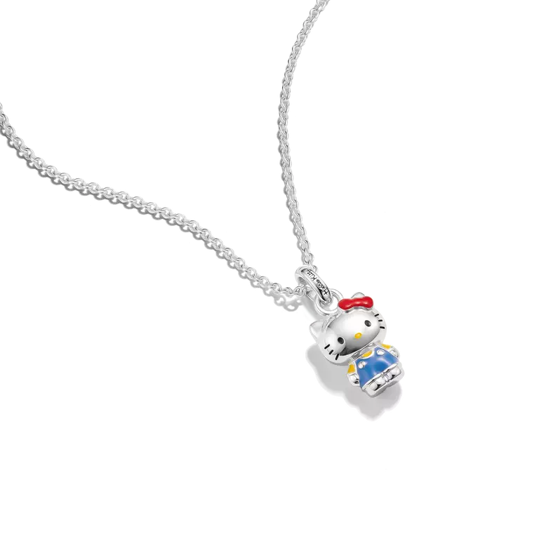 A silver chain necklace featuring a Hello Kitty pendant with white enamel, a red bow, and blue and yellow details, shown on a plain white background.