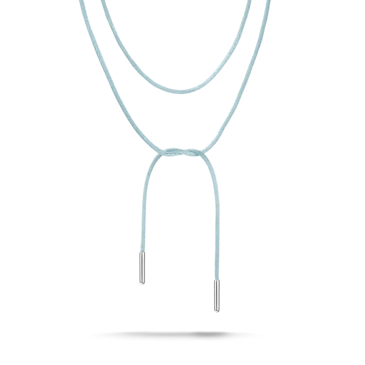 A double-layered cord necklace in a light pastel blue color, featuring silver metal tips at the ends of the hanging cords, shown against a plain white background.