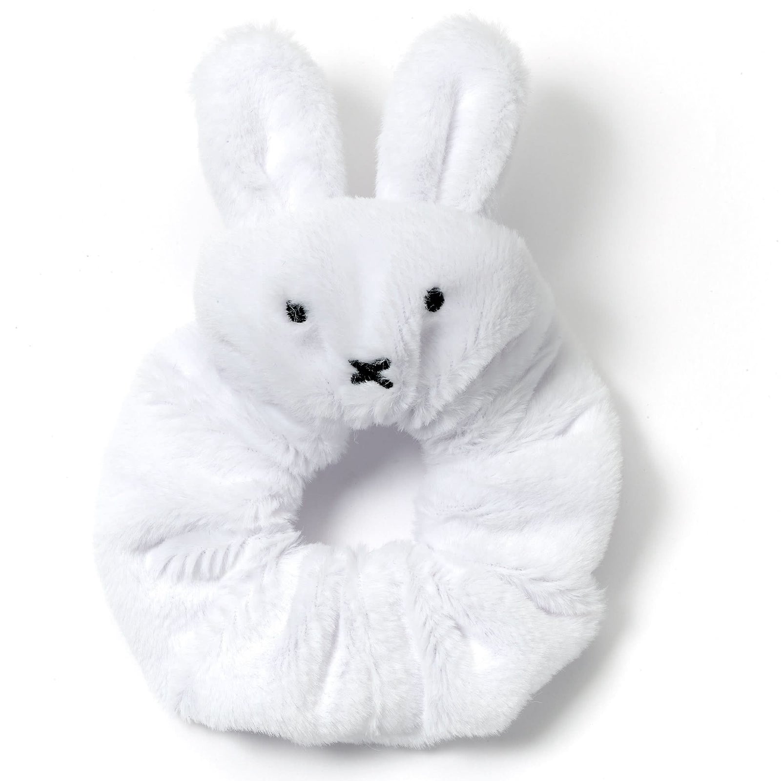 White plush bunny toy on a white background