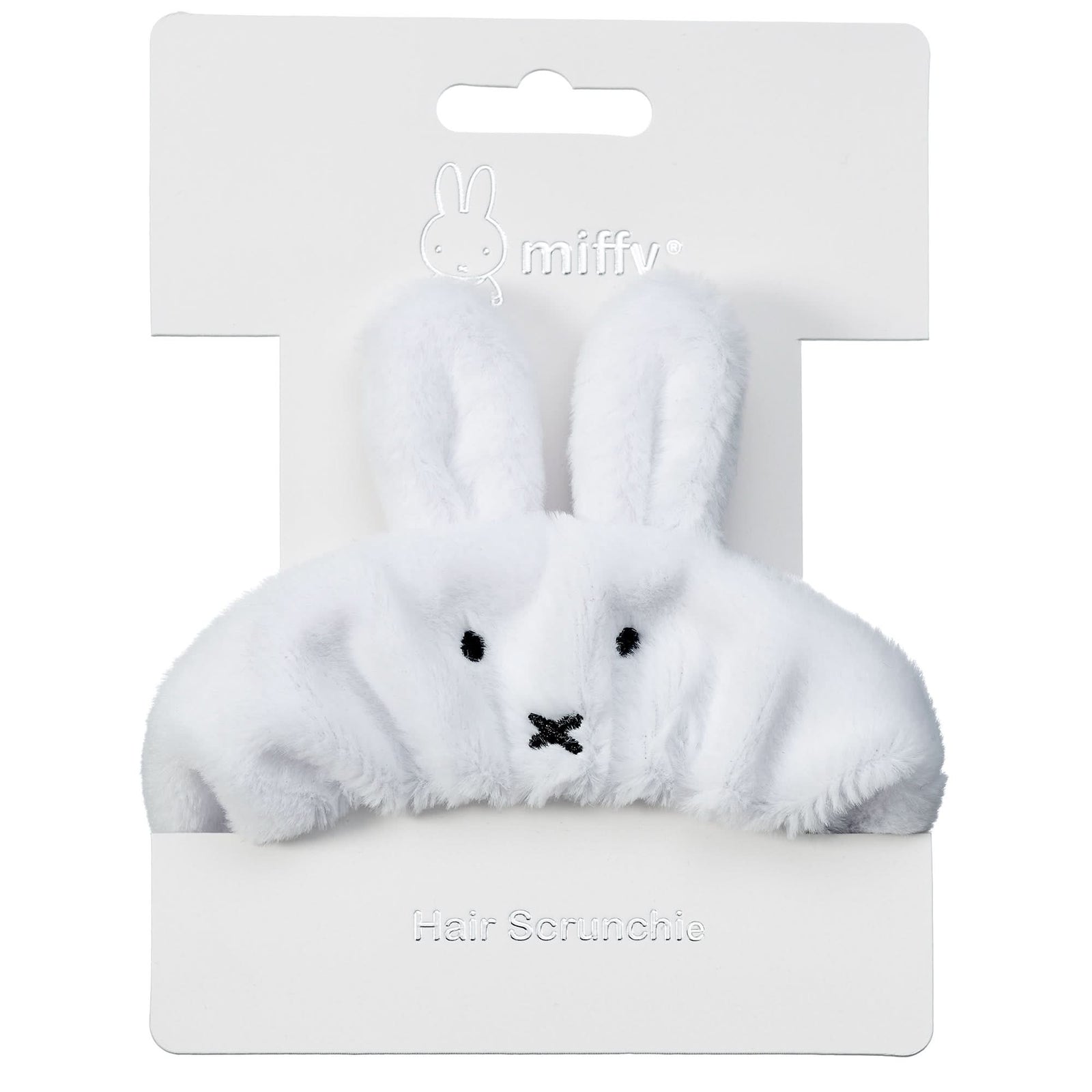 White plush bunny toy on a white background