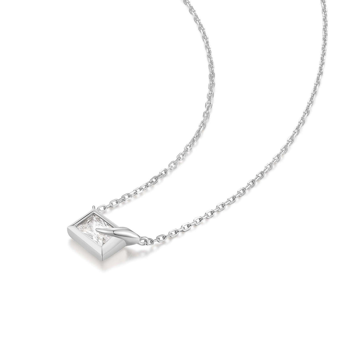 Silver necklace with a pendant on a white background