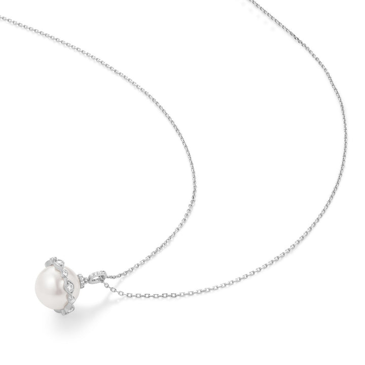 Pearl necklace with silver chain on a white background