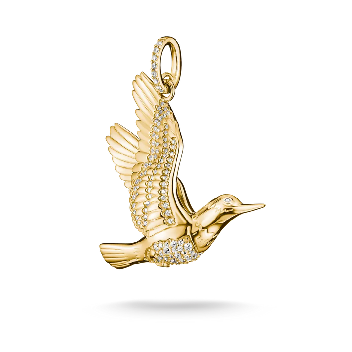 A gold bird pendant with wings spread, adorned with small clear stones, shown on a clean white background.