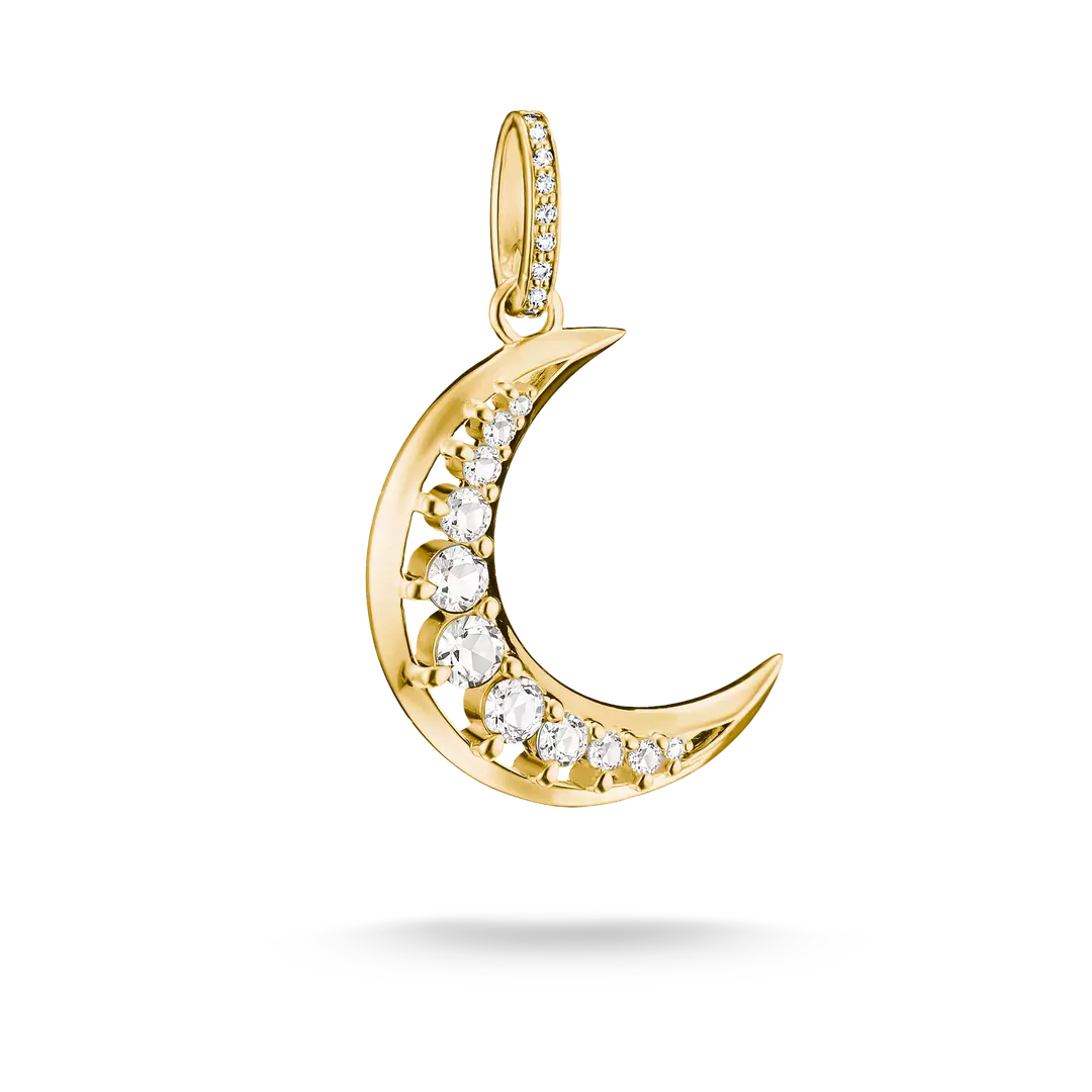 A gold crescent moon pendant adorned with clear round-cut gemstones along the inner curve, shown on a clean white background with a soft shadow beneath.