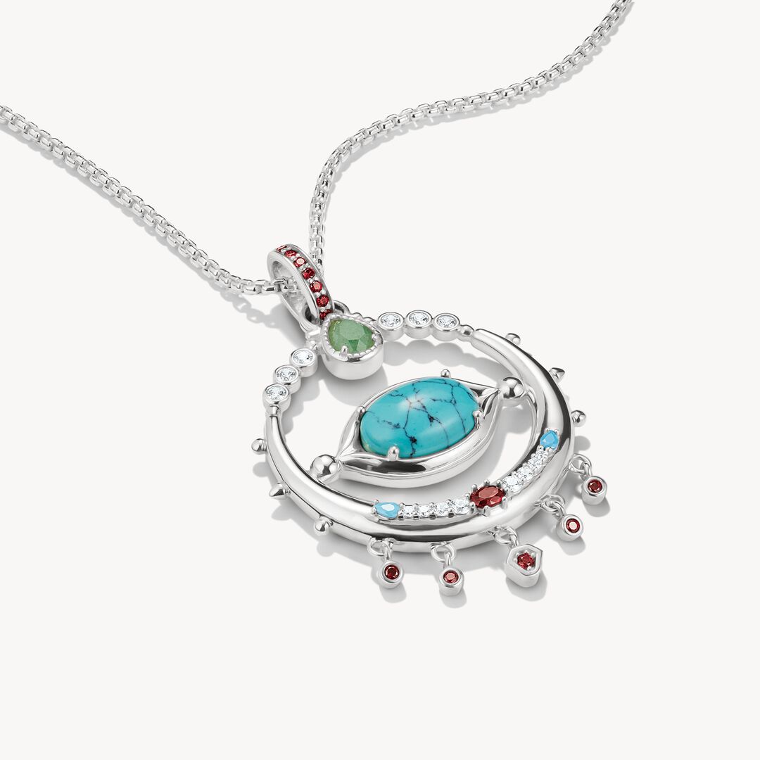 Silver necklace with a heart-shaped pendant featuring turquoise stone and smaller gemstones on a white background