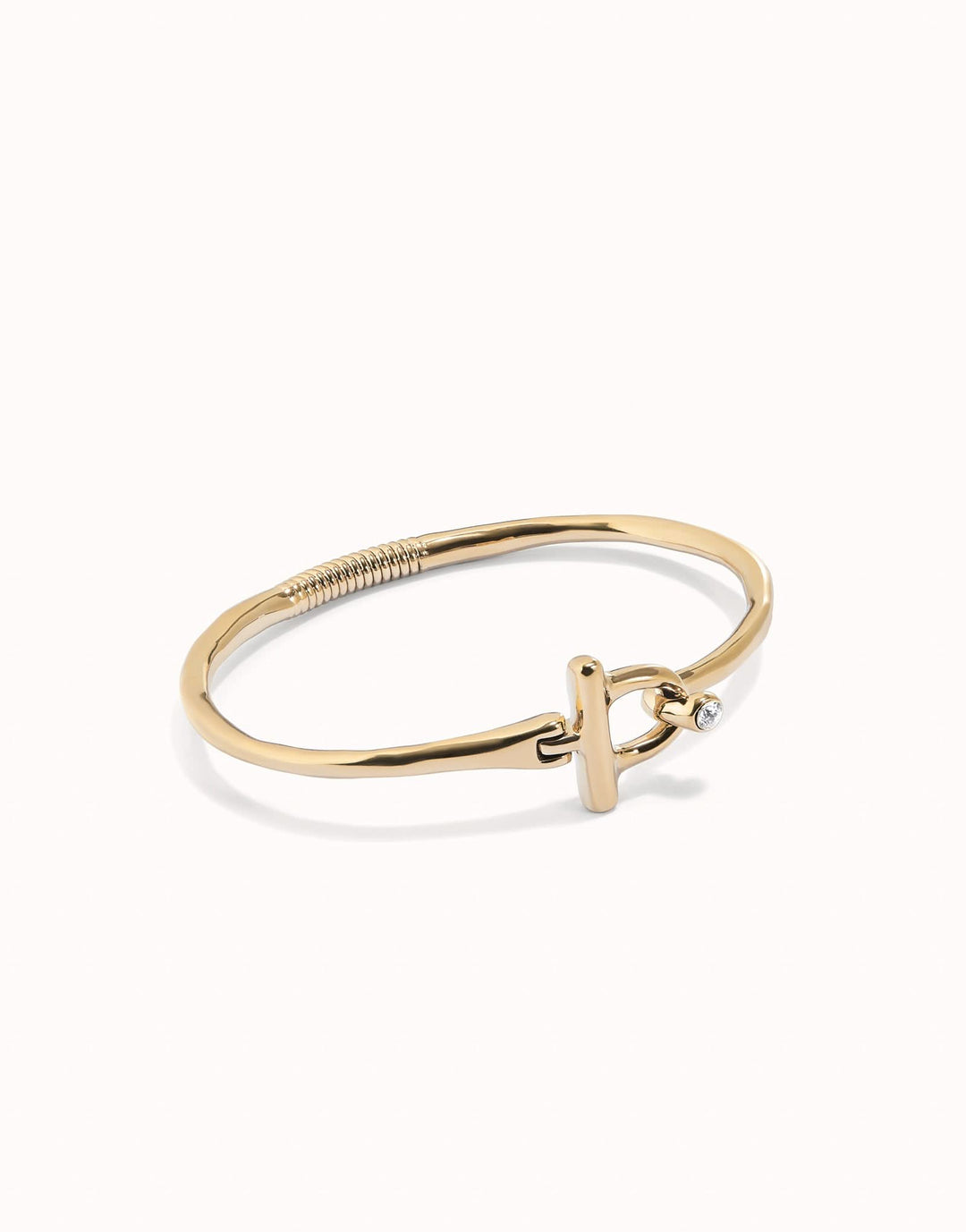 Stunning close-up of the 18k Gold Plated Ser Indomable White Bangle Bracelet PUL2449BLNORO0, highlighting the intricate craftsmanship and luxurious finish.