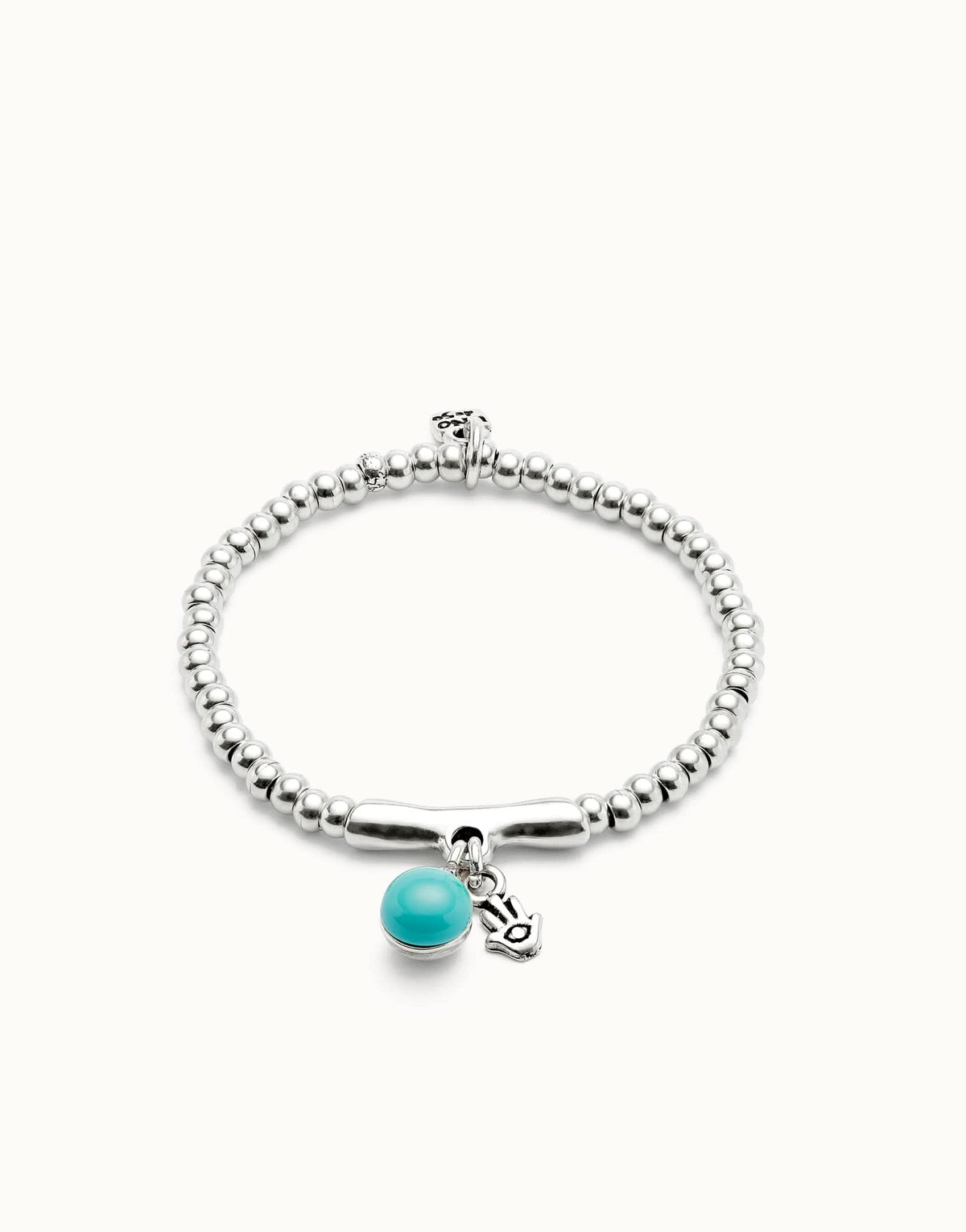 Elegant Sterling Silver Plated Ser Fascinante Turquoise Bracelet, showcasing Murano glass and hamsa details for a captivating accessory.